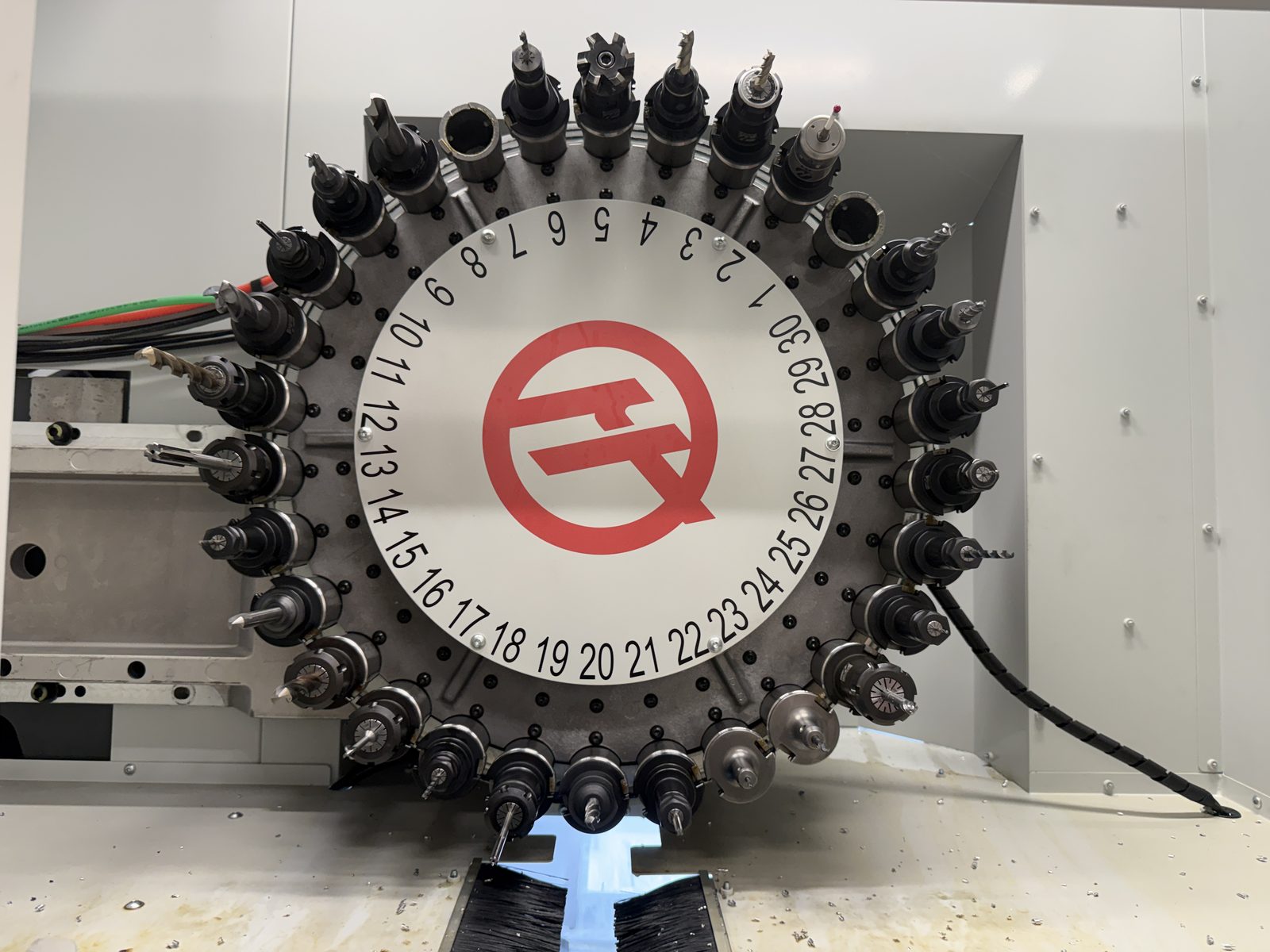 Haas side-mount tool changer carousel loaded with cutting tools