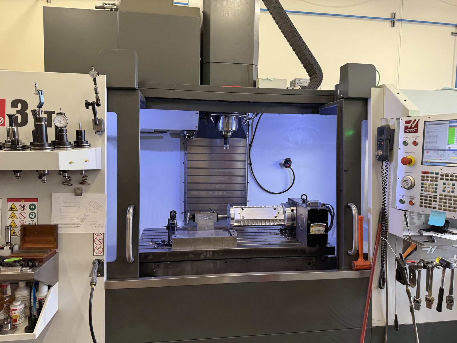 Haas VF-3YT vertical machining center with HRT210 4th-axis rotary and tailstock setup